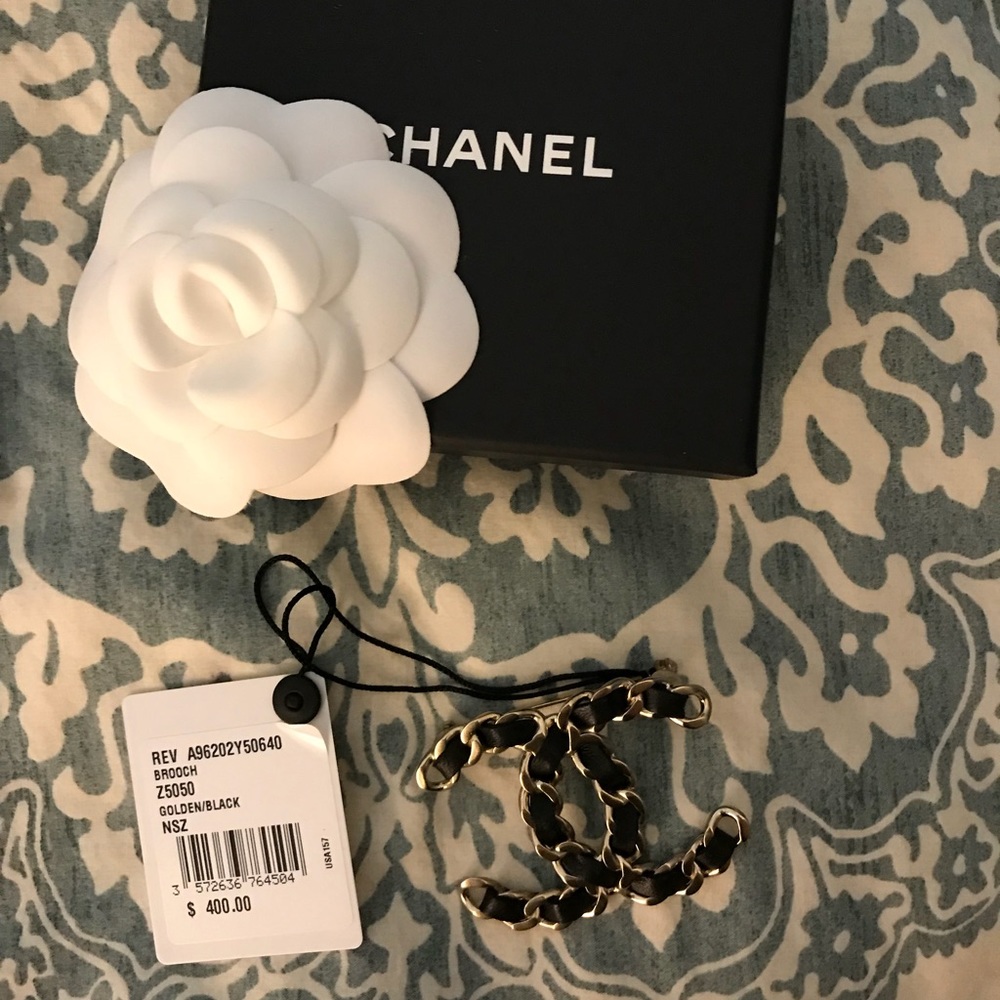 Authentic CHANEL pin. Never worn, still has tag.